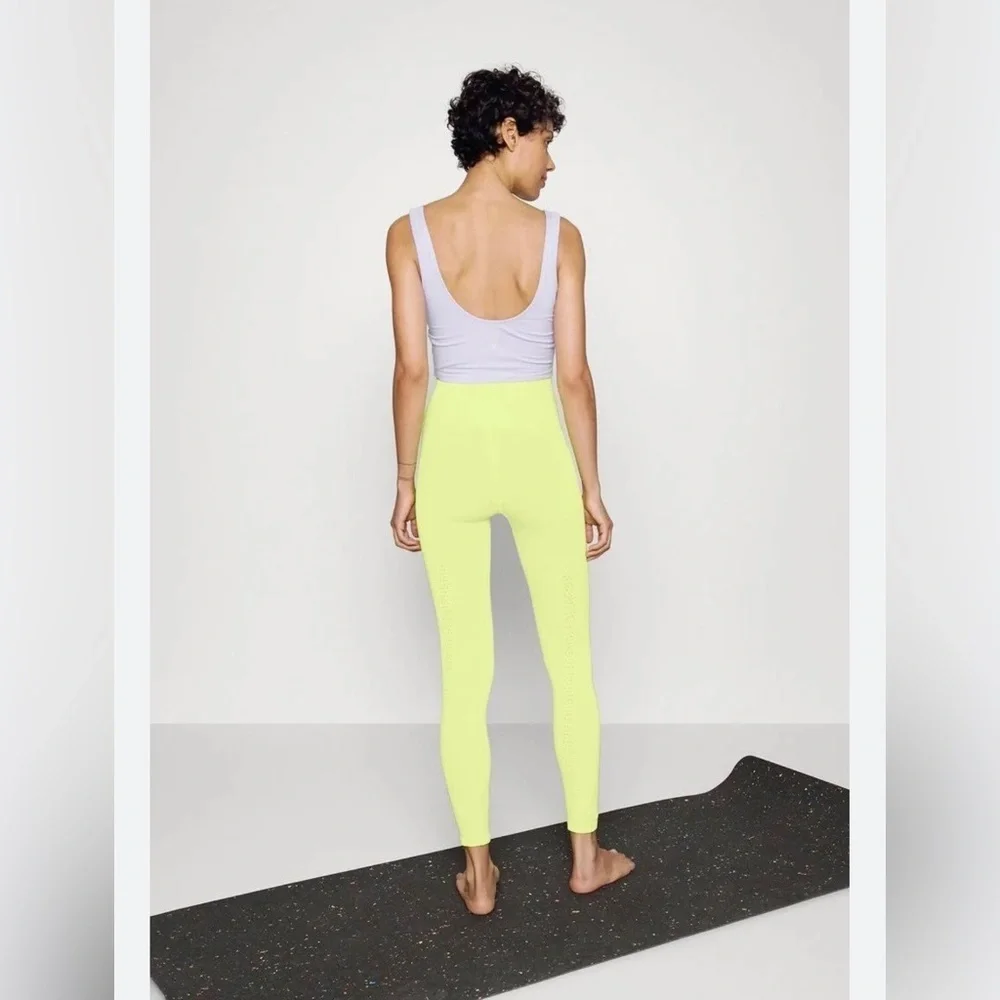 NWT. $78R Free People Good Karma Leggings. Margarita. Size M/L